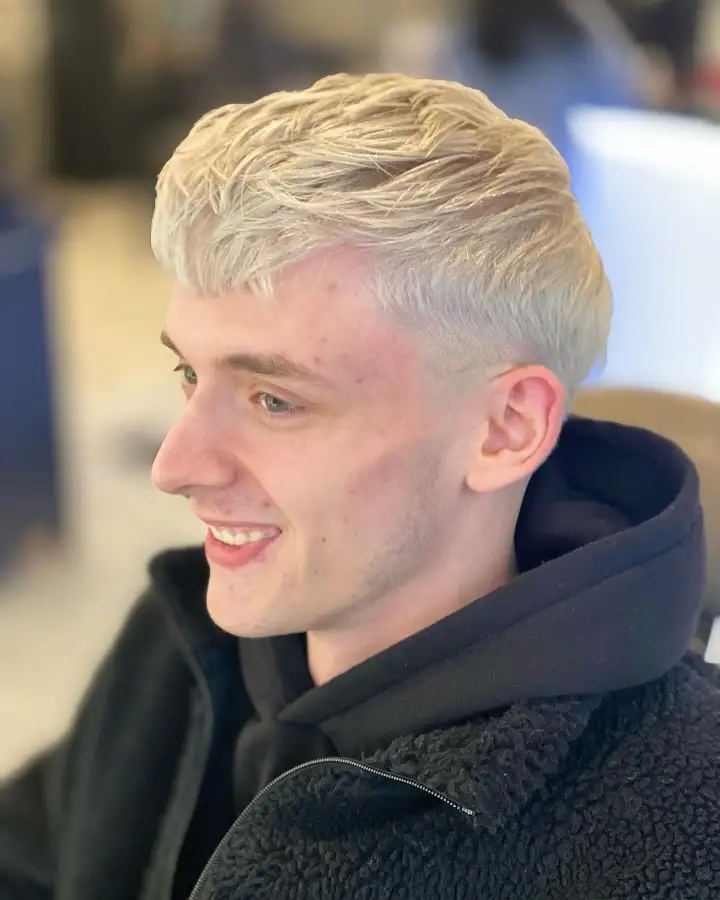 15 Cool Blonde Hair Ideas for Men That Look Fresh, Not Bleached 6 Platinum Textured Fringe Pushed Forward