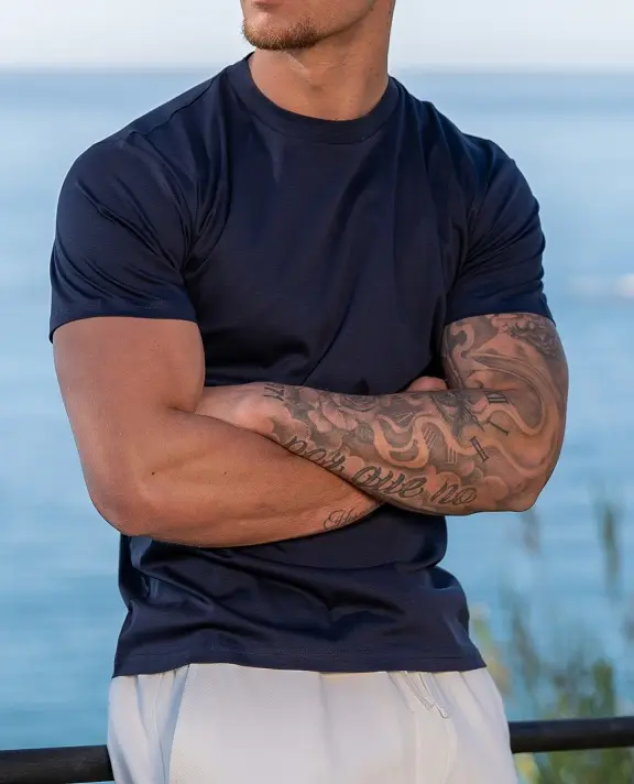 21 Men's T-Shirt Outfit Ideas That Actually Look Put Together 11 Navy Fitted Tee With Stone Drawstring Shorts