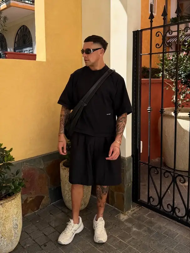 22 Black Shorts Outfit Ideas for Men That Actually Look Put Together 19 Heavy Tee and Wide Pleated Shorts for Warm Weather