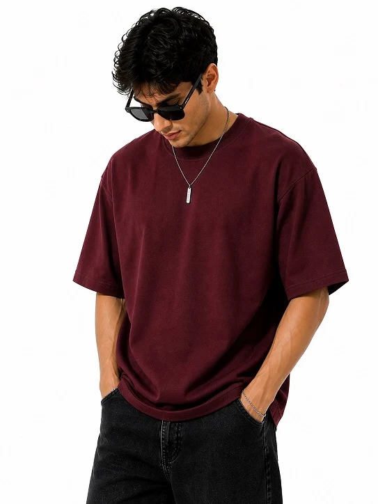 21 Men's T-Shirt Outfit Ideas That Actually Look Put Together 9 Burgundy Oversized Tee With Washed Black Denim