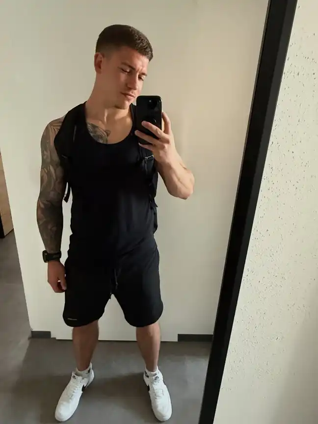All Black Tank and Shorts With Clean White Sneakers