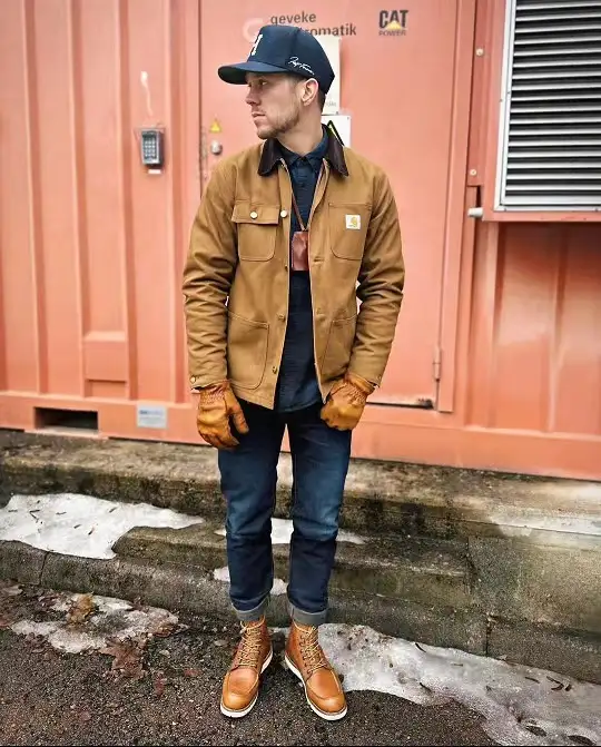 21 Winter Work Outfit Ideas for Men, From Wool Suits to Jobsite Layers 8 Tan Chore Coat With Denim and Tan Boots
