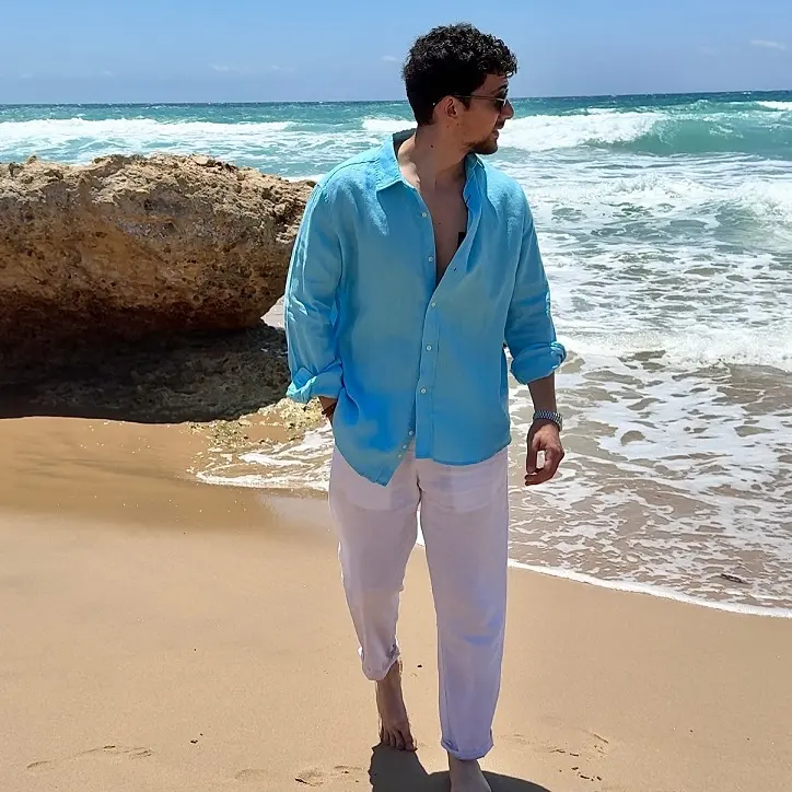 Turquoise Linen Shirt Over Soft White Trousers