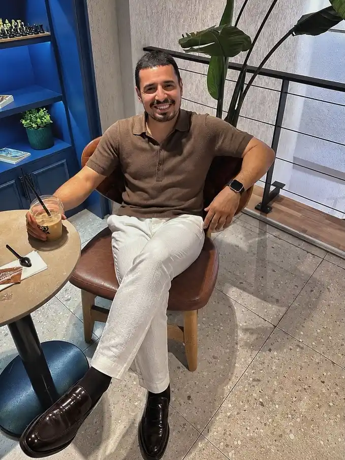 22 Coffee Date Outfits for Men That Make a Great First Impression 23 Knit Polo and White Trousers, the Combo That Looks Good in Every Photo