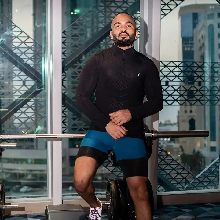 Black Textured Long Sleeve Over Teal Compression Shorts