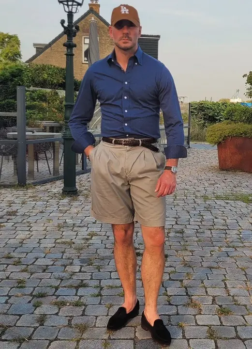 Navy Shirt With Khaki Pleated Shorts and Velvet Loafers