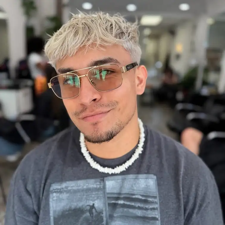 15 Cool Blonde Hair Ideas for Men That Look Fresh, Not Bleached 8 White Blonde Spiky Crop With Dark Brows Left Alone