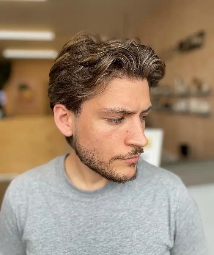15 Cool Blonde Hair Ideas for Men That Look Fresh, Not Bleached 13 Brown Base With Fine Blonde Ribbons and a Soft Quiff