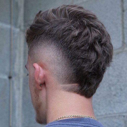 22 Warrior Haircut Ideas for Men: Braids, Fades, and Full Beards 22 Burst Fade With Length Left at the Nape