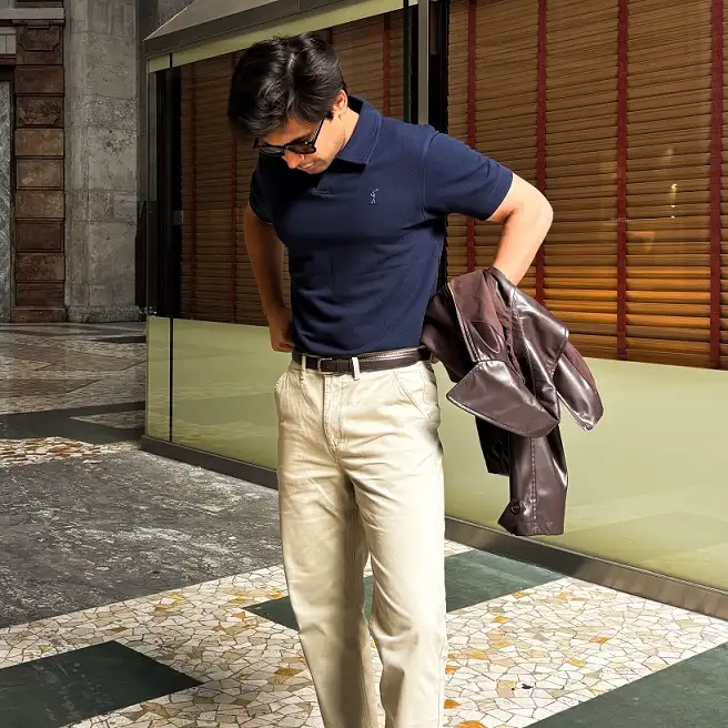 Navy Polo and Cream Trousers