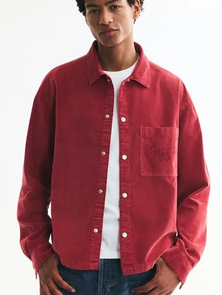 Washed Red Corduroy Overshirt Over a White Tee