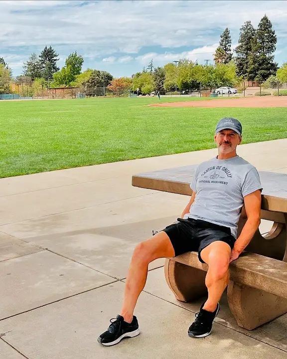 Summer Fashion for Older Gentlemen: 17 Timeless Outfits That Still Feel Fresh 7 Graphic Tee and Black Shorts for Everyday Summer