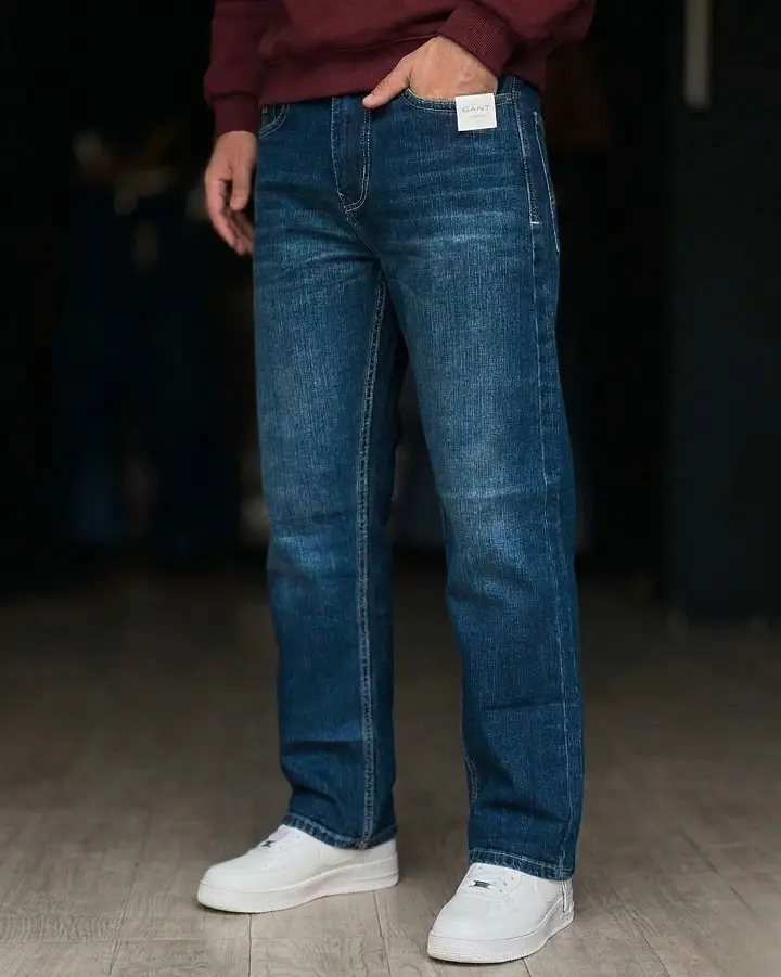 29 Summer Capsule Wardrobe Essentials for Men's Carry-Ons 28 Mid Blue Straight Leg Jeans for Cool Evenings