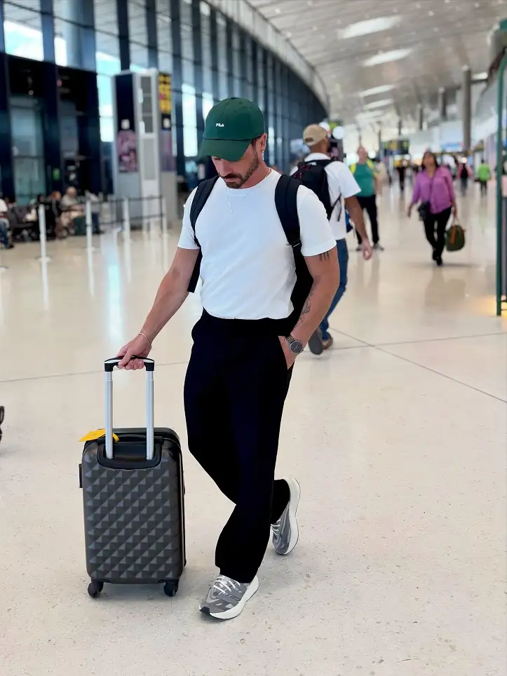 18 Airport Outfit Men Summer Ideas That Stay Cool All Flight 3 Plain White Tee and Black Tailored Trousers