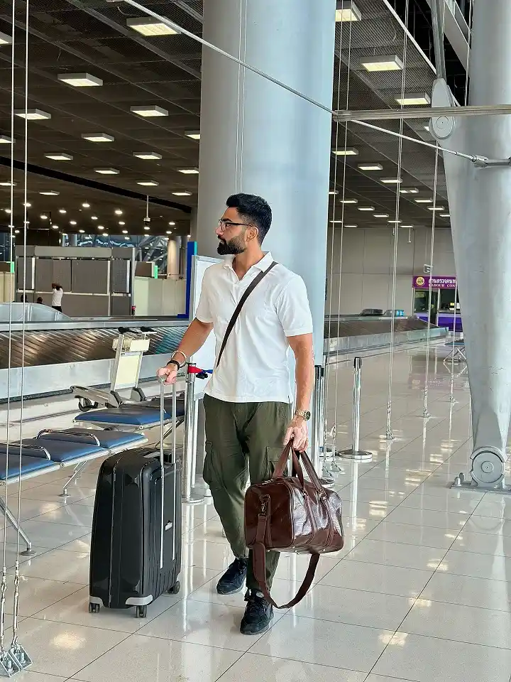 18 Airport Outfit Men Summer Ideas That Stay Cool All Flight 12 Crisp White Polo With Olive Cargo Trousers