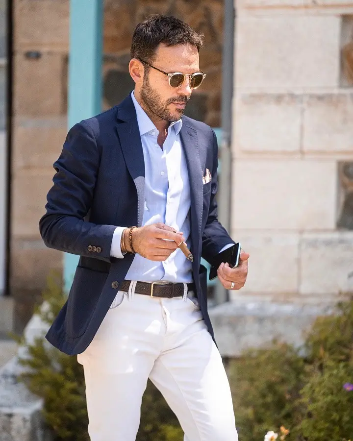 29 Summer Capsule Wardrobe Essentials for Men's Carry-Ons 12 An Unstructured Navy Blazer for the One Formal Night