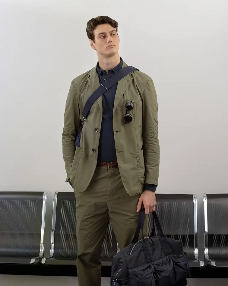 18 Travel Capsule Wardrobe Ideas for Men: Fly Light, Look Sharp 8 An Airport Terminal Is the Real Test for a Travel Outfit