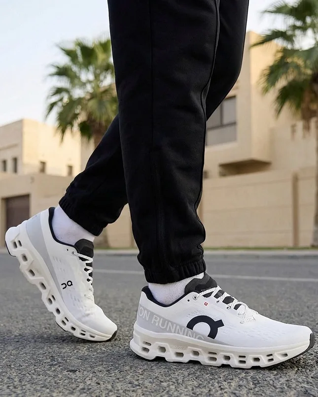 18 Best Men's Sneakers for Work That Actually Pass a Dress Code 16 On Cloudmonster: Clean White Comfort With a Sharper Look