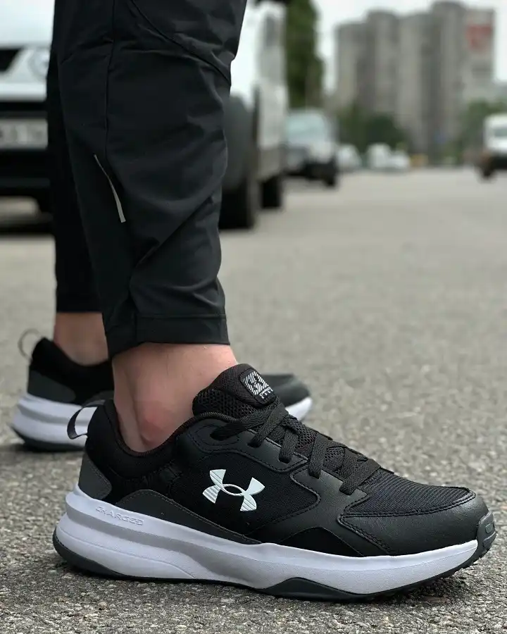 18 Best Men's Sneakers for Work That Actually Pass a Dress Code 14 Under Armour Charged: All Black for Jobs With a Uniform Rule