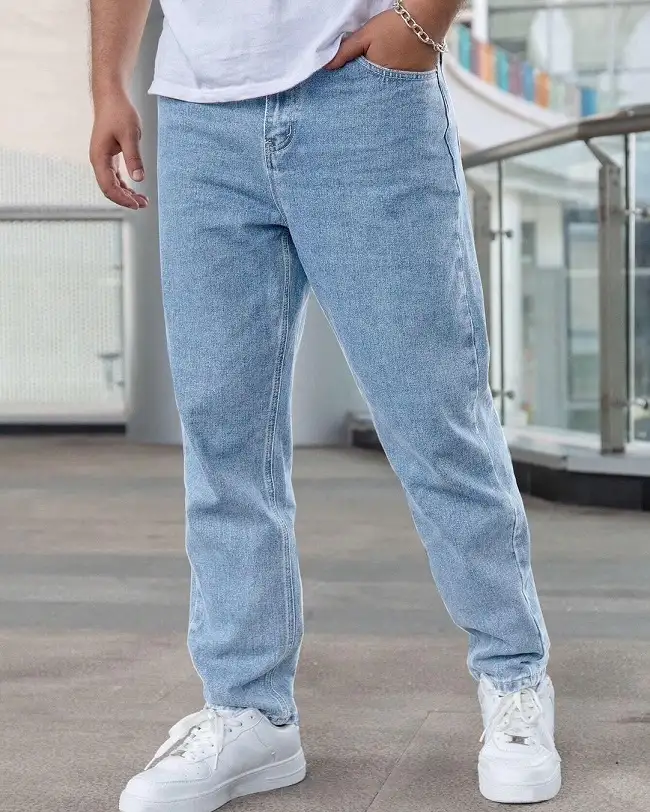 27 Minimalist Jeans and Pants for Men That Work in Every Season 9 Light Wash Relaxed Jeans for the Hottest Months