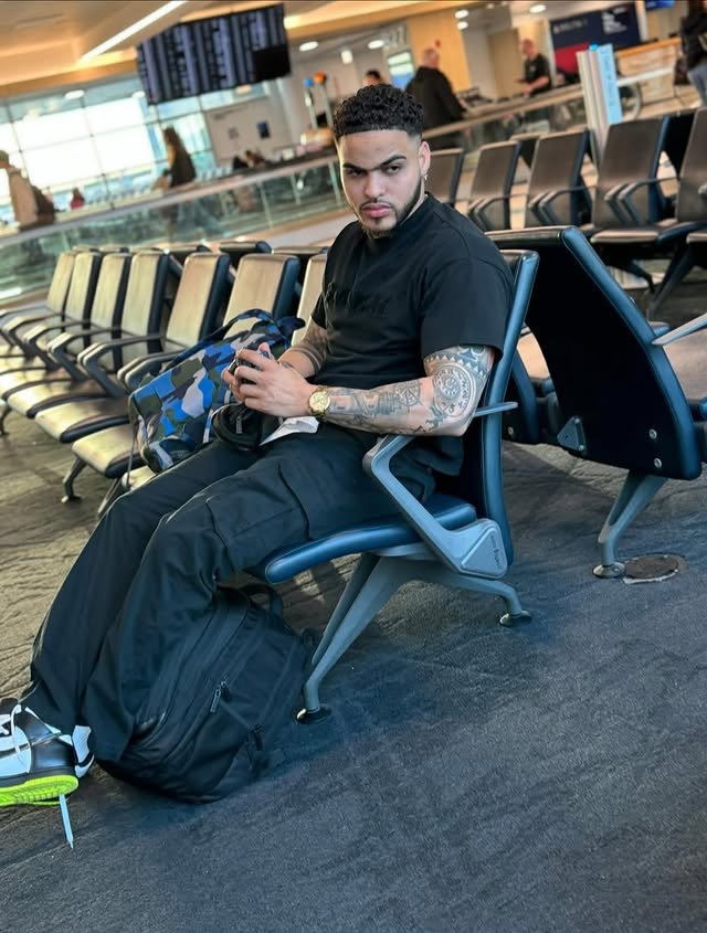Looking Good at the Gate: 10 Summer Vacation Airport Outfit Ideas for Men 3 2. The Monochromatic Utility Look