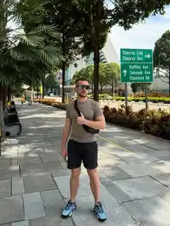14 Airport Outfit Men With Sneakers Combos to Steal 9 8. Earth Tone Tee and Dark Shorts