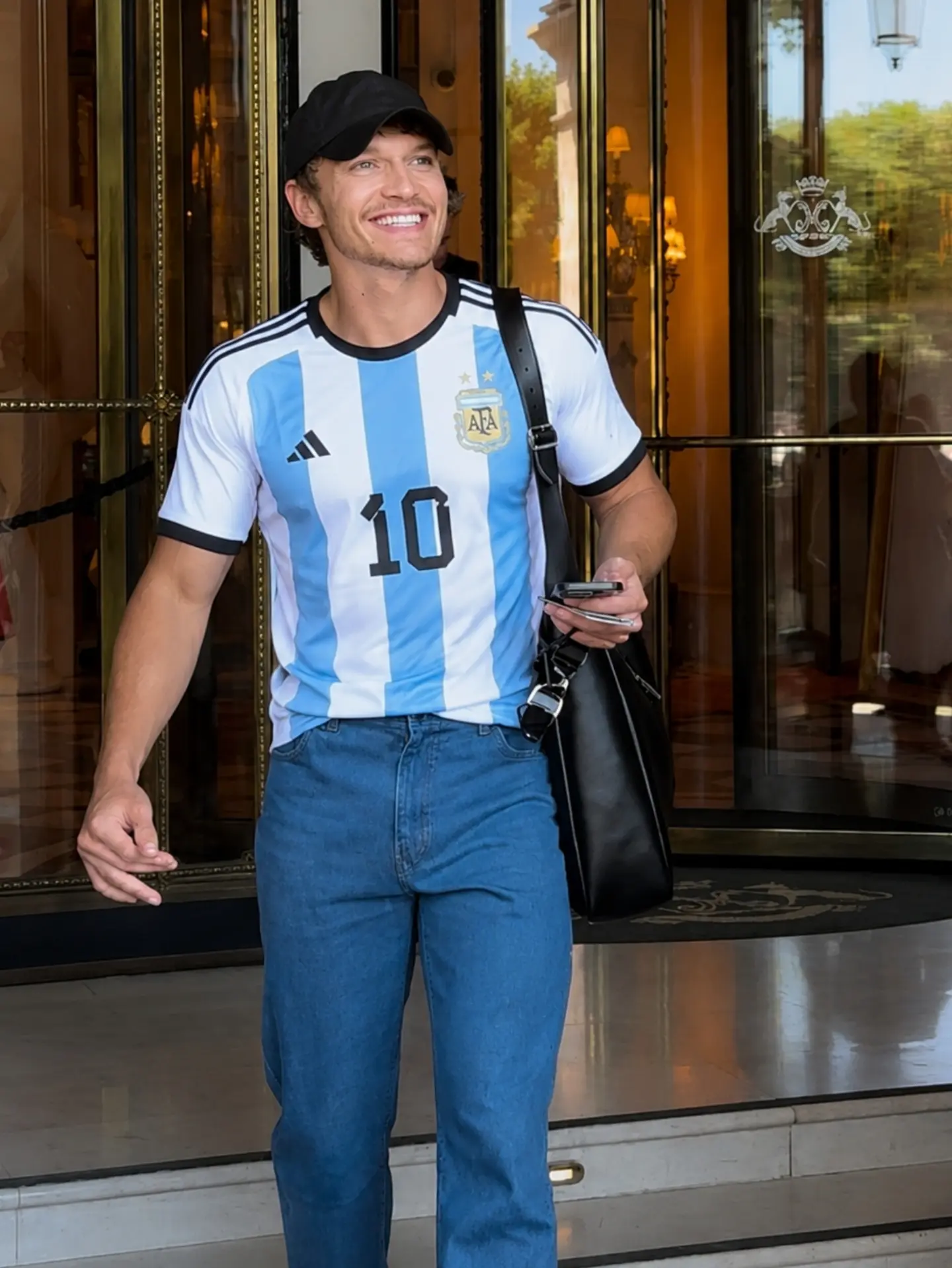 2. Argentina Jersey With Blue Jeans and Black Cap