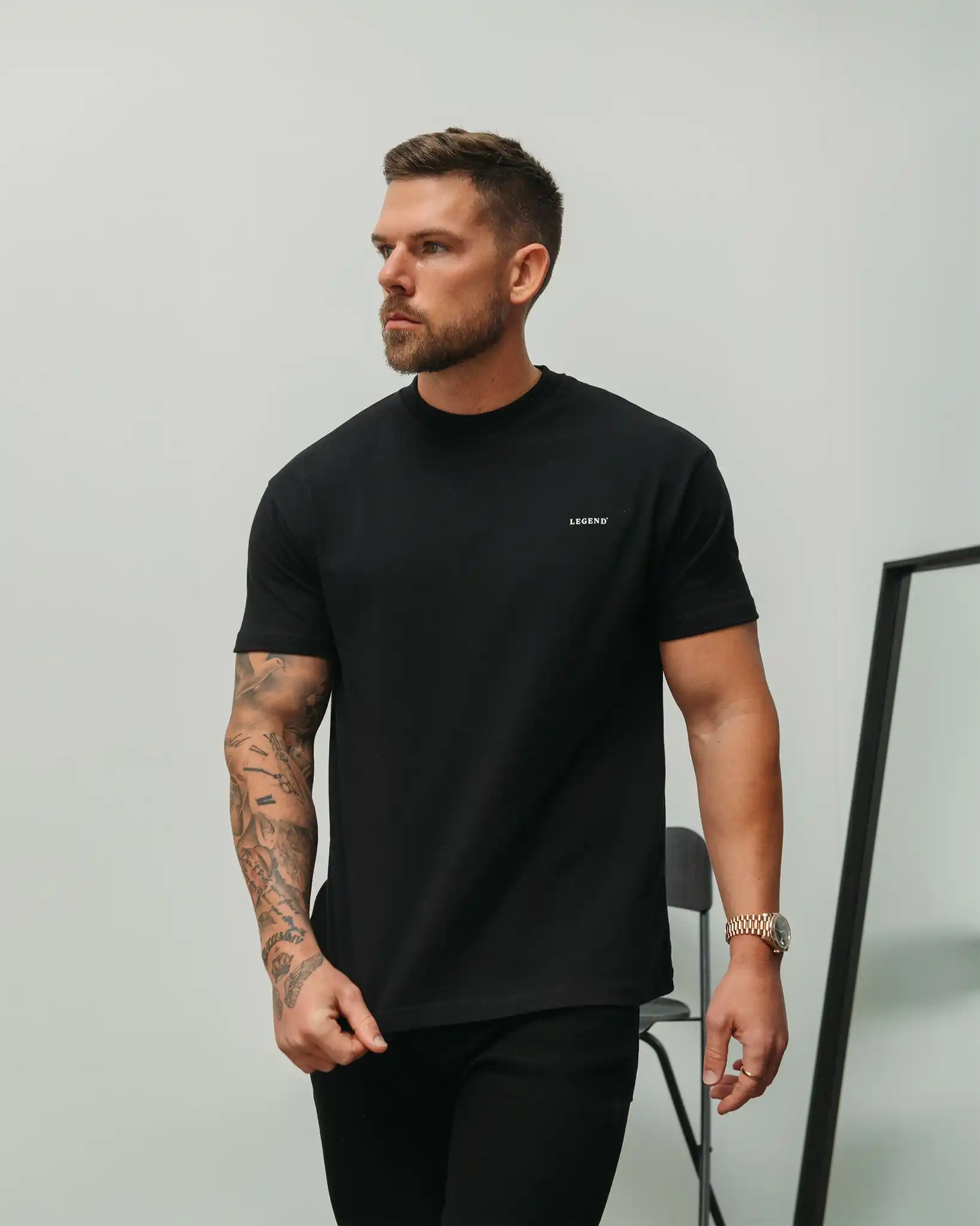 17 Men’s Minimalist Nightout Outfits (No Overdressing) 17 16. Logo Accent Tee and Slim Jeans