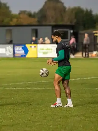 17. Layered Training Top with Bright Green Shorts