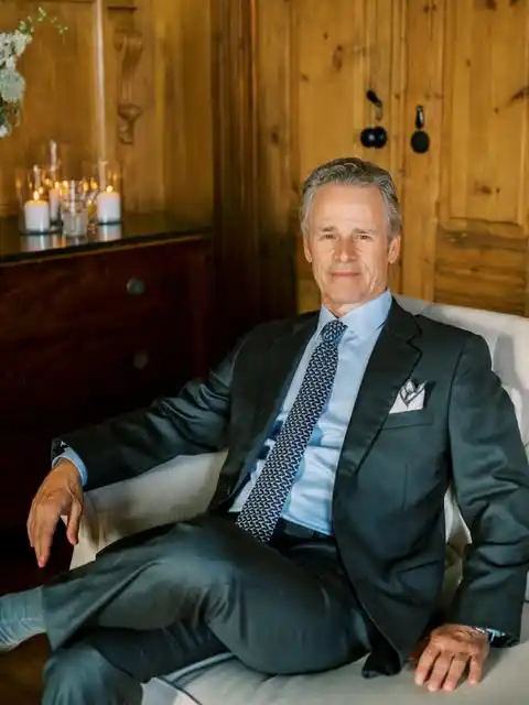 5. The Dark Tailored Suit and Patterned Tie