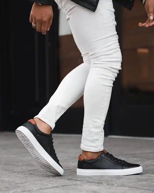 15 Shoe Styles That Complement Tall Men (Balance Height) 2 1. Low Top Chunky Sneakers