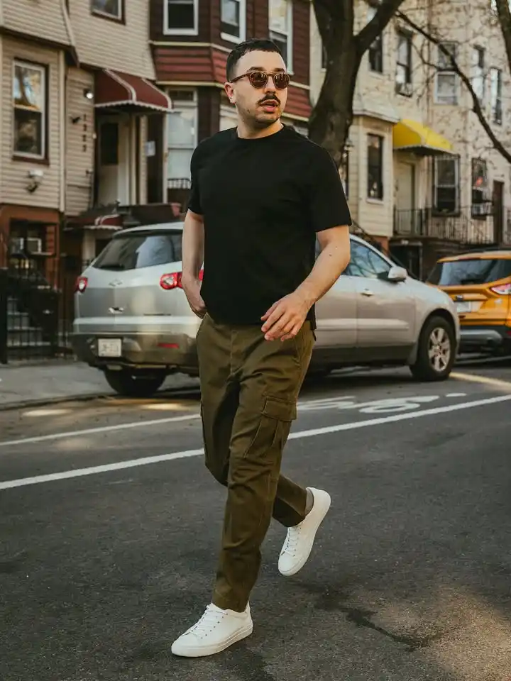 15 Classy Streetwear Outfit Ideas for Men That Elevate the Game 3 1. Tailored Olive Cargos and Minimal Black Tee