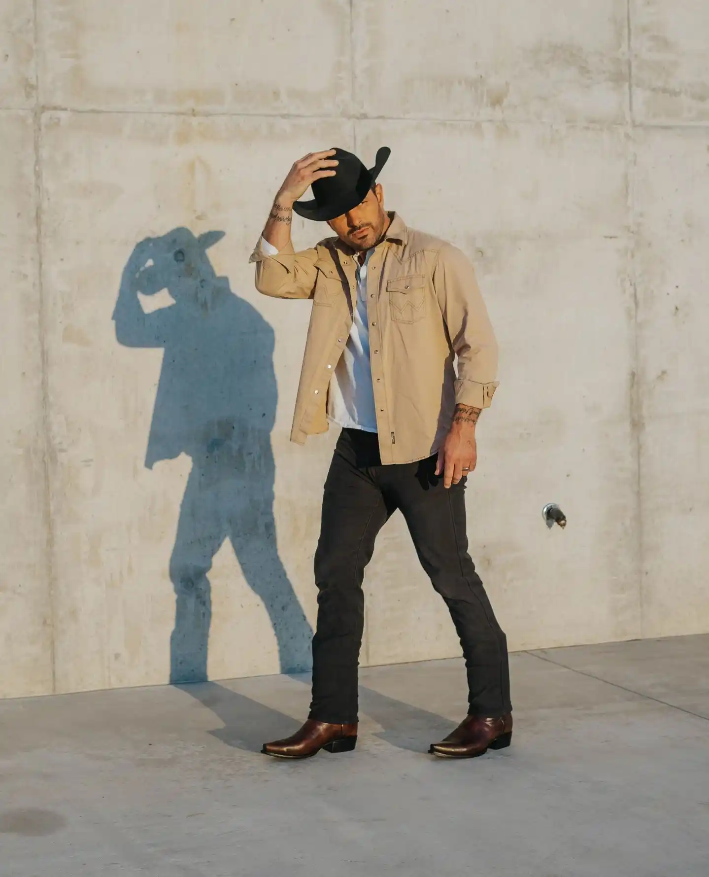 15 Shoe Styles That Complement Tall Men (Balance Height) 7 6. Western Cowboy Boots