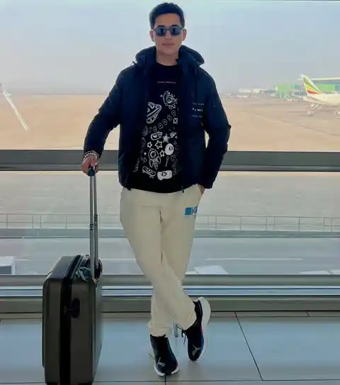 10 Airport Outfit Men Summer Looks That Beat the Heat in Style 8 7. Hooded Puffer and Light Trousers