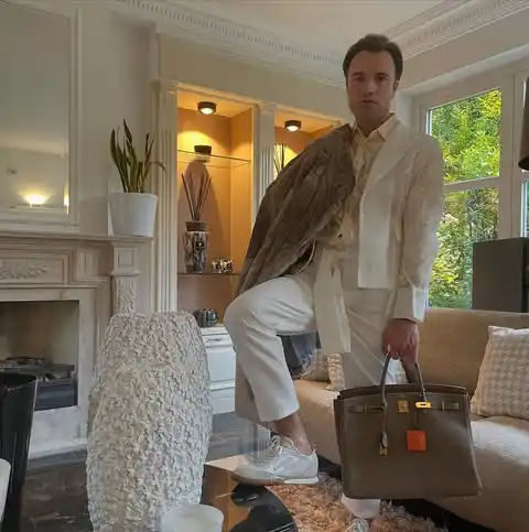 12. Monochromatic Ivory Suit and Taupe Leather Tote