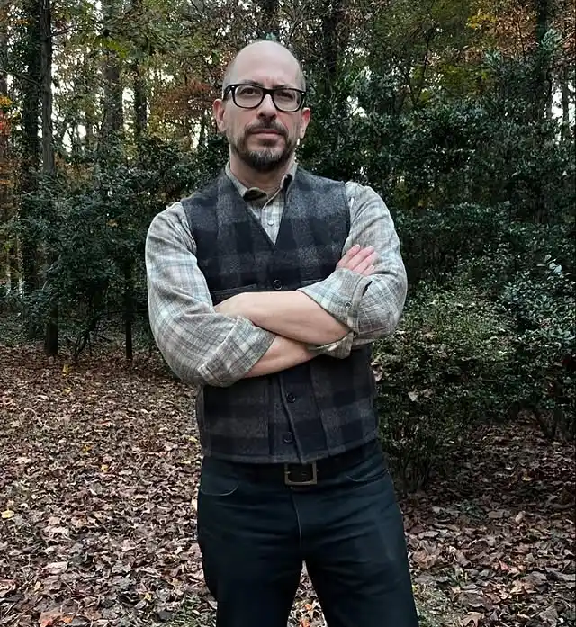 15 Classy Winter Outfit Combos for Men 14 12. Plaid Vest and Checkered Flannel Shirt