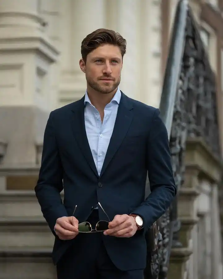 13 Classy Outfits Men Holiday Party Looks for Festive Season 6 5. Sleek Navy Suit with Open Collar