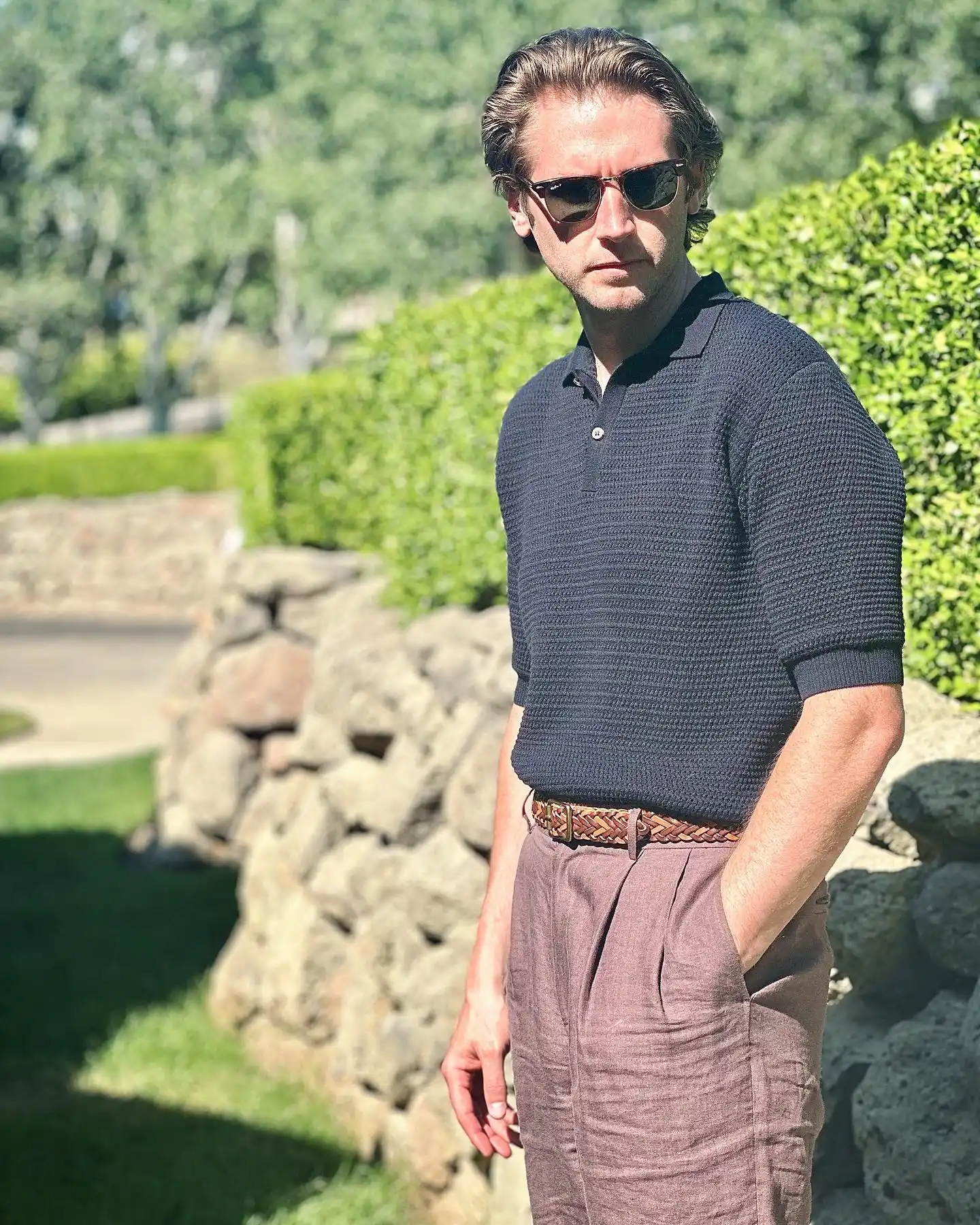 13 Classy Summer Outfit Ideas for Men That Beat the Heat in Style 5 3. Knit Polo and Linen Trousers