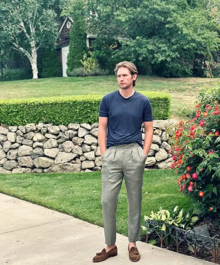 13 Classy Summer Outfit Ideas for Men That Beat the Heat in Style 3 1. Pleated Linen Trousers and T-Shirt