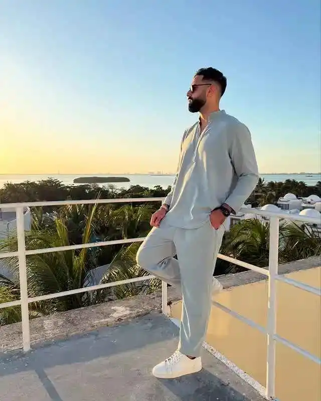 17 Resort‑Ready Men’s Outfits for Tropical Vacations 15 14. Mint Green Co-ord Set and White Sneakers
