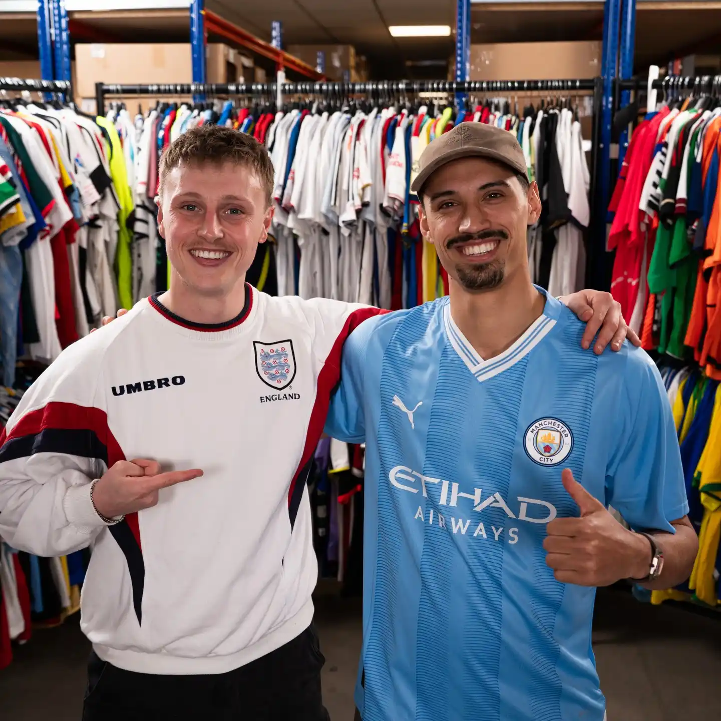 13. Vintage England Sweatshirt Jersey and Manchester City Kit Styled in a Jersey Store