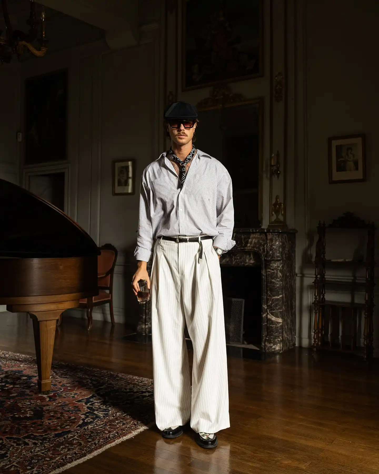 13. The Oversized Striped Shirt and Wide Leg Pleated Trousers