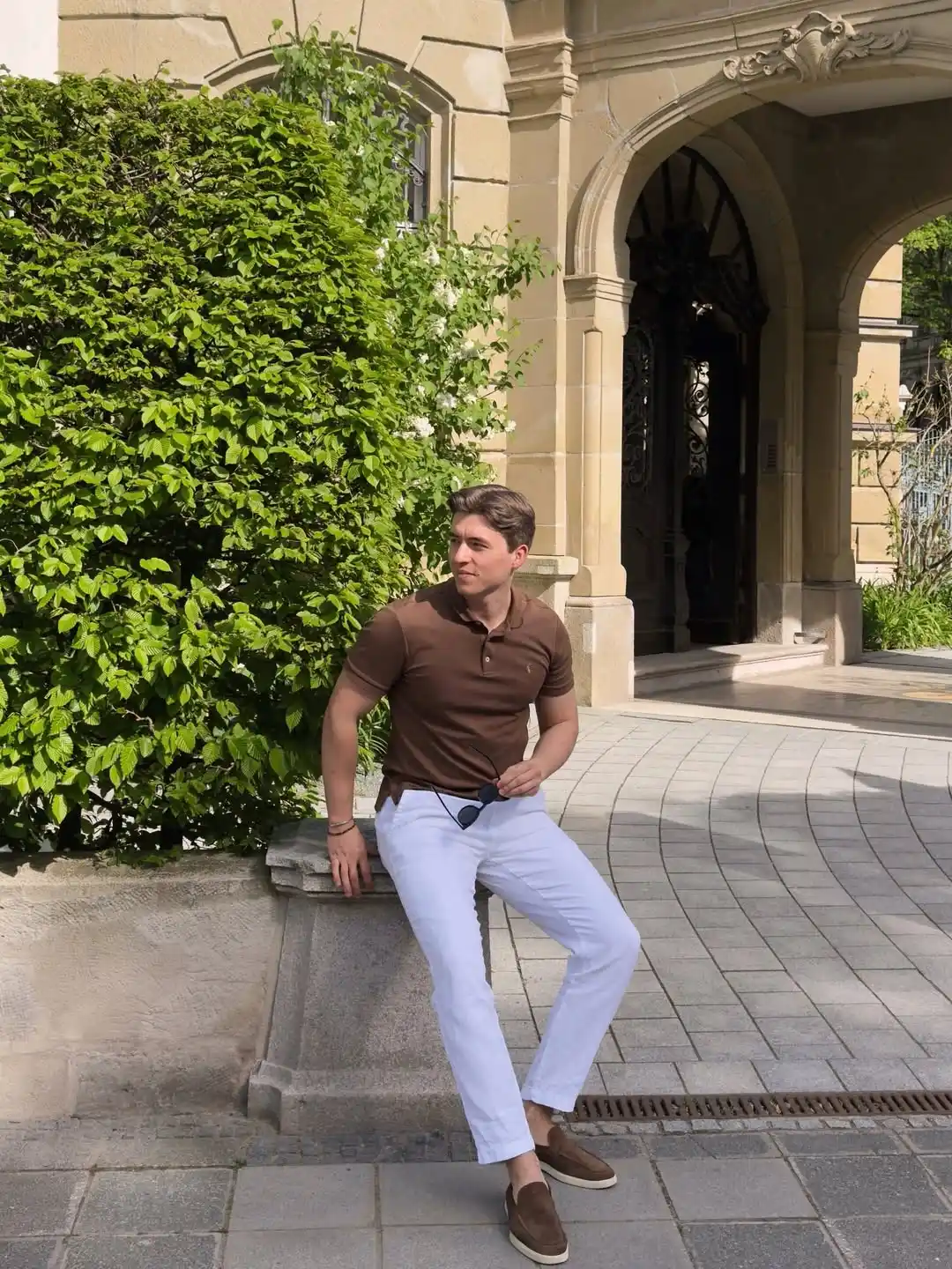 2. The Earth Tone Polo and Crisp White Trousers