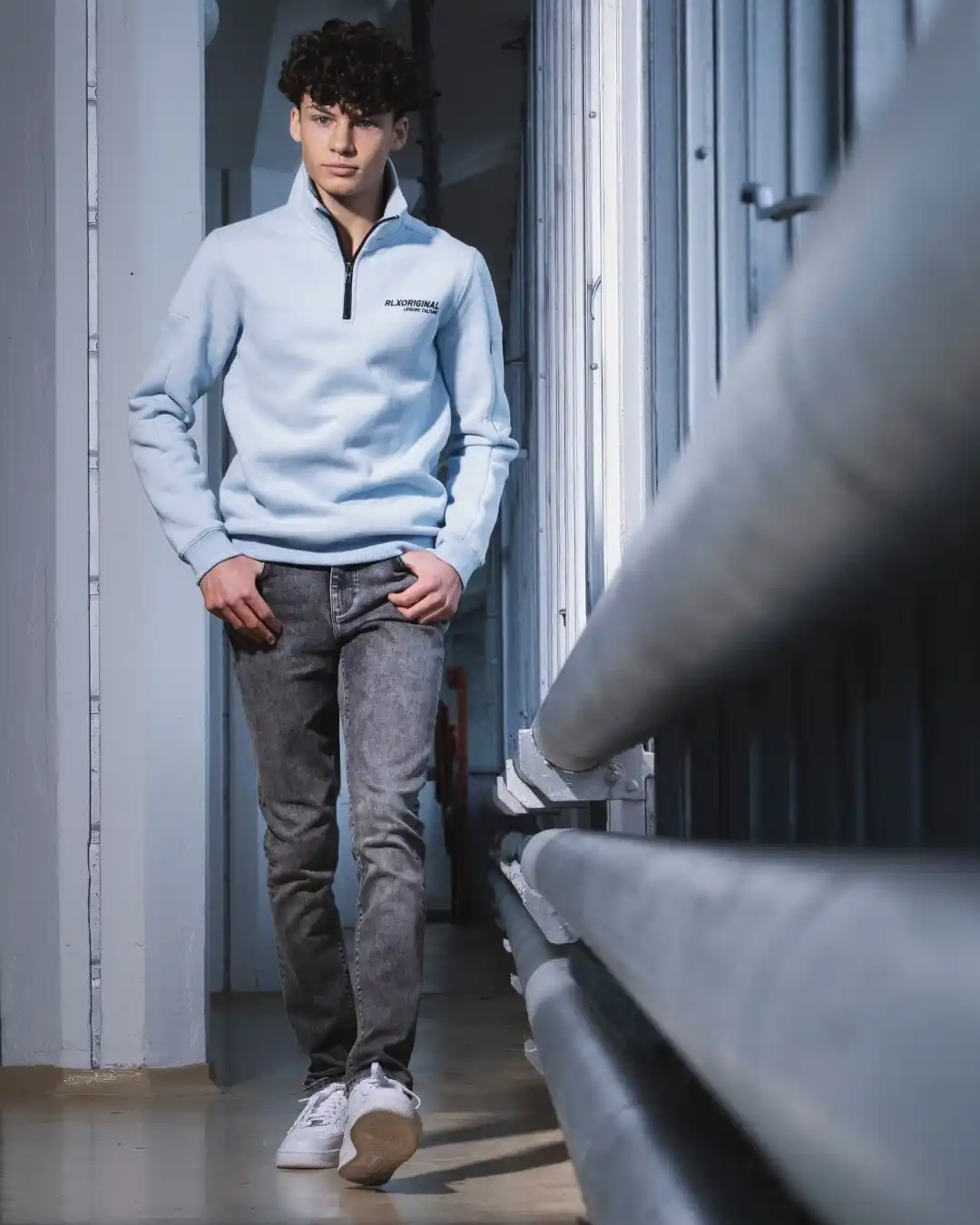 11. Sporty Quarter Zip and Acid Wash Denim
