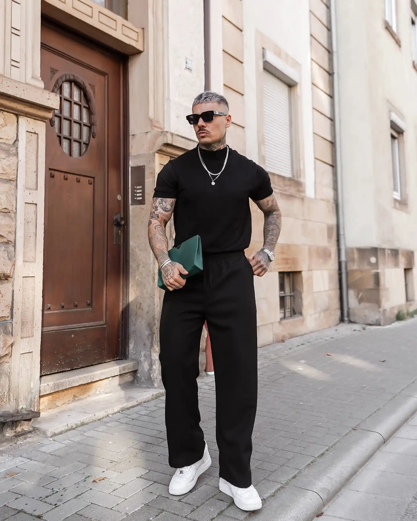15 Classy Streetwear Outfit Ideas for Men That Elevate the Game 10 8. All Black Mock Neck and Relaxed Trousers
