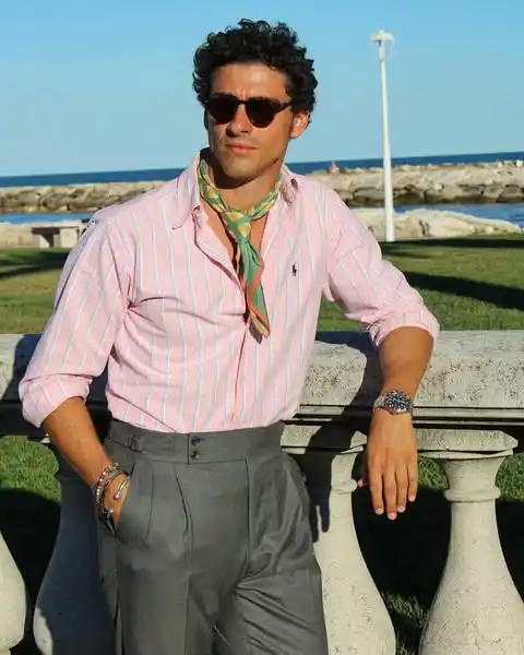 13 Classy Summer Outfit Ideas for Men That Beat the Heat in Style 11 9. Pink Striped Shirt and Grey Gurkha Trousers