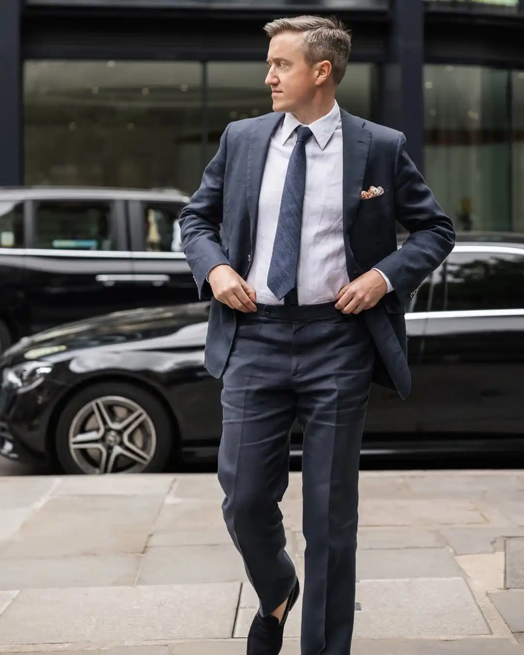 15. The Deep Grey Suit and Textured Tie