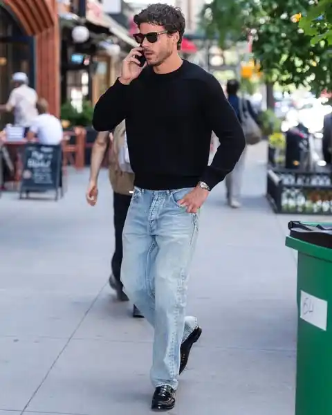 15 Classy Streetwear Outfit Ideas for Men That Elevate the Game 6 4. Black Crewneck Sweater and Light Wash Denim