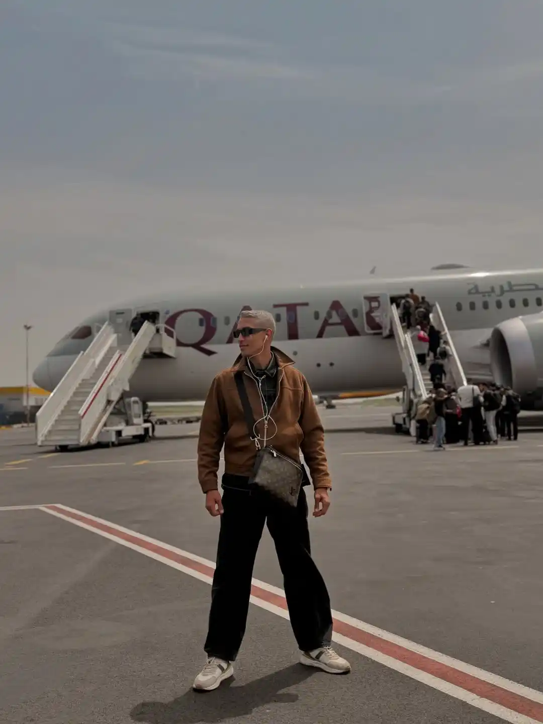 10 Airport Outfit Men Over 40 Looks That Feel Age-Appropriate 2 1. The Suede Jacket and Wide Leg Trousers