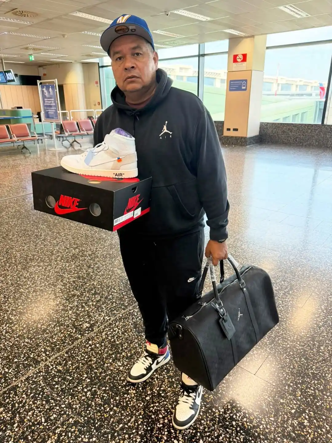 14 Airport Outfit Men With Sneakers Combos to Steal 10 9. Branding Heavy Sportswear and High Tops